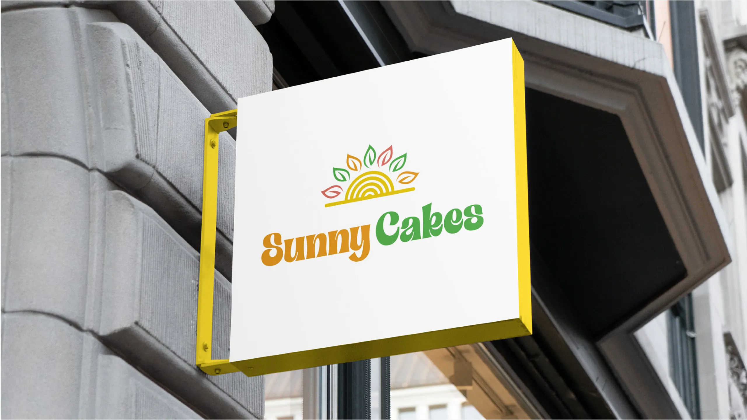 Sunny Cakes packaging detail showing restrained palette, display type, and custom pattern